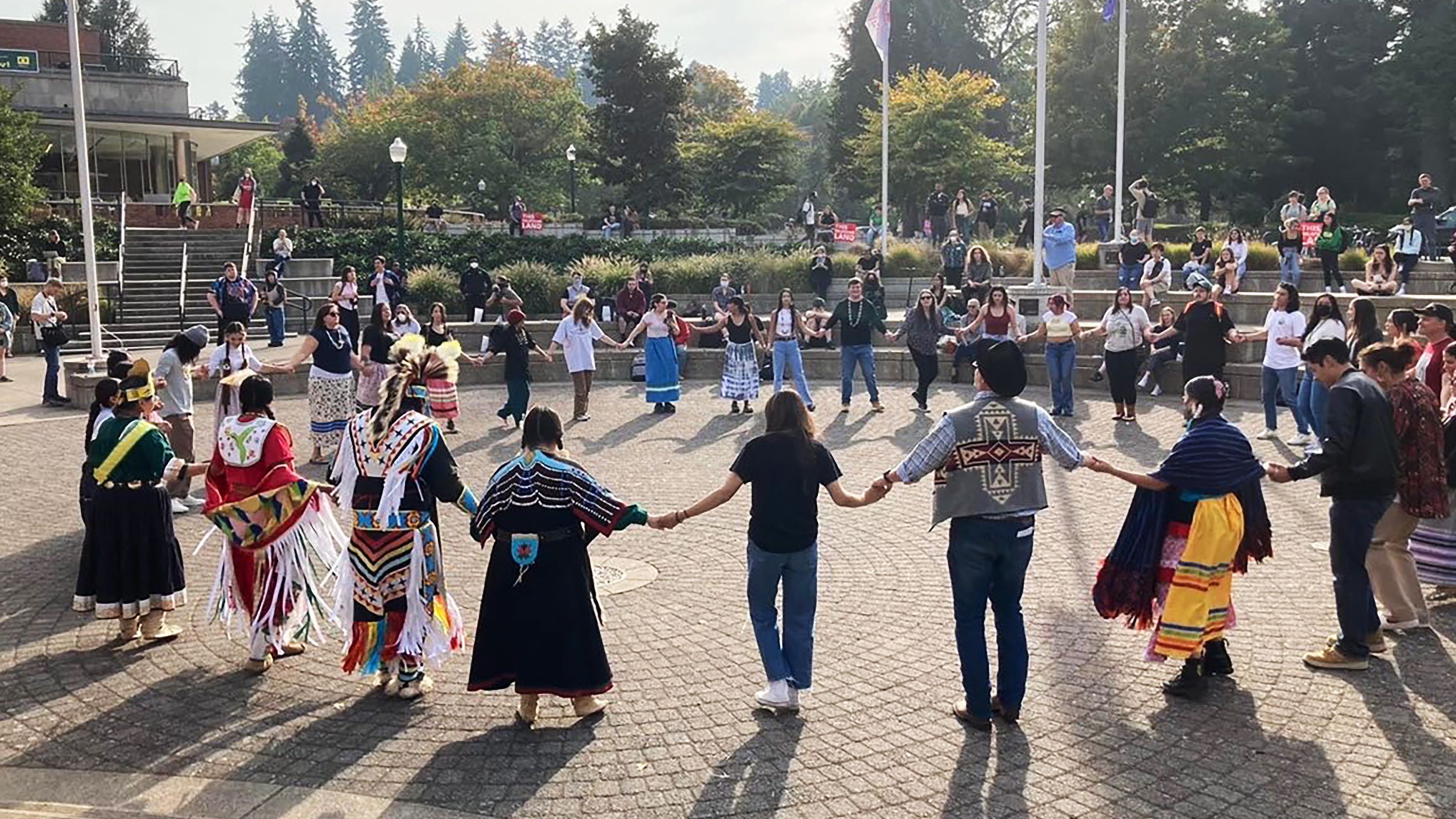 Indigenous Peoples' Day celebration at the University of Oregon honoring tribal communities and sharing their history and traditions. 