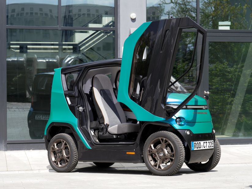 The CT-1 features vertically rising doors that make it easier to access the car in a narrow space.