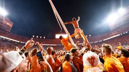 Tennessee fans tear down the goal post after defeating Alabama 52-49 in an NCAA college football game Saturday, Oct. 15, 2022, in Knoxville, Tenn. 