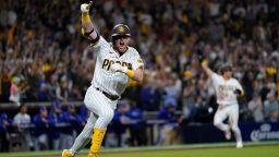 San Diego Padres' Jake Cronenworth reacts after hitting a two-run single during the seventh inning in Game 4 of a baseball NL Division Series against the Los Angeles Dodgers, Saturday, Oct. 15, 2022, in San Diego.