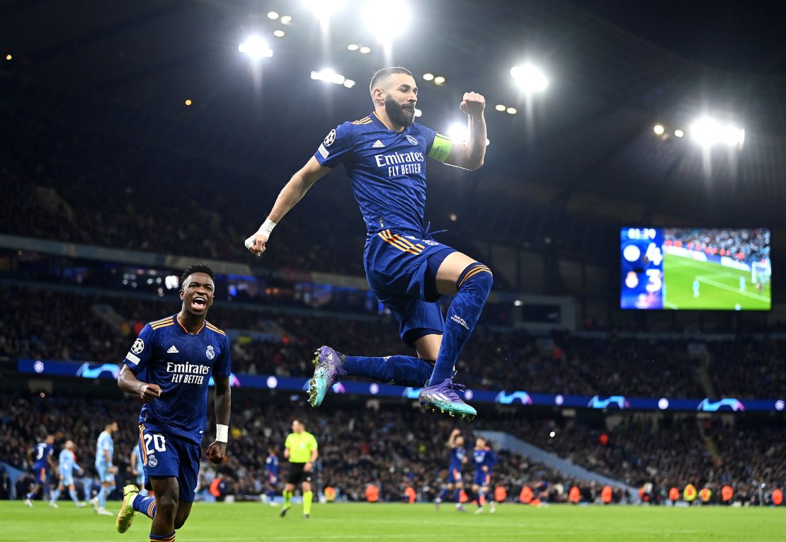 Benzema celebrates after scoring against Manchester City in the Champions League. 