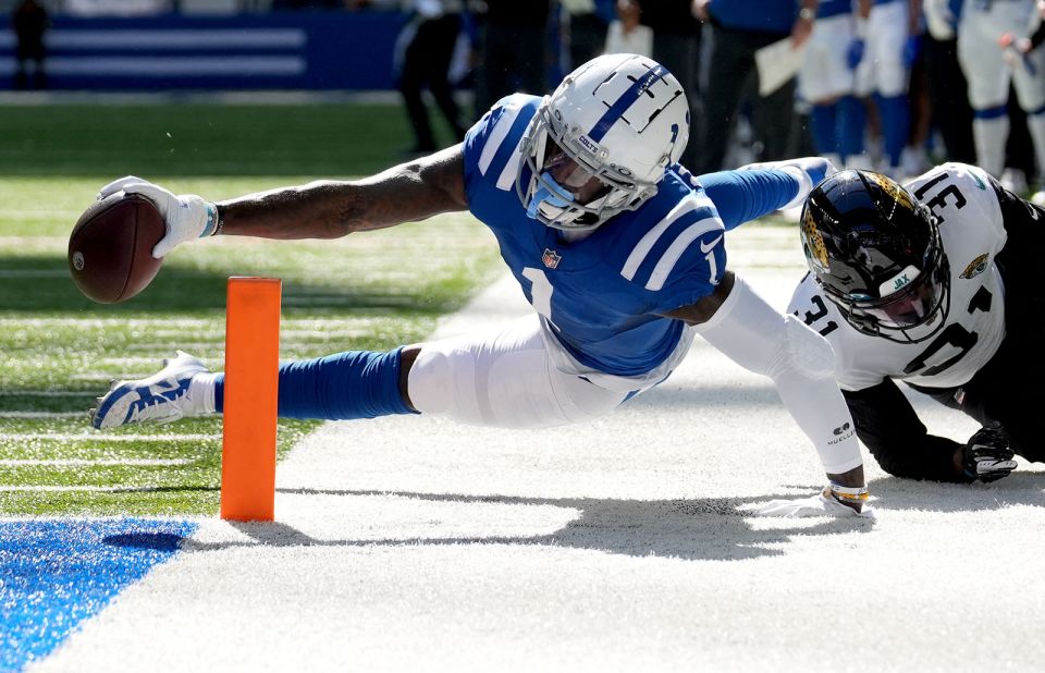 Indianapolis Colts wide receiver Parris Campbell stretches to get the ball over the pylon for a touchdown while defended by Jacksonville Jaguars cornerback Darious Williams. The Colts beat their division rivals 34-27 thanks to a last-gasp touchdown from quarterback Matt Ryan to rookie Alec Pierce. 