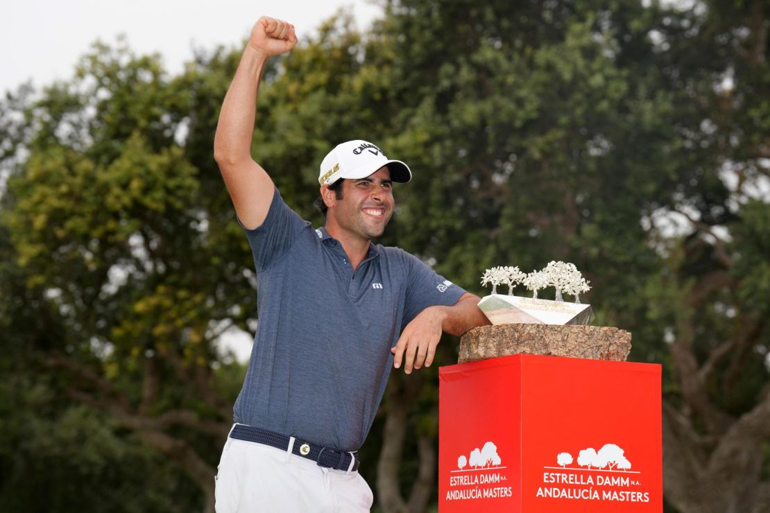 Otaegui celebrates with the trophy.