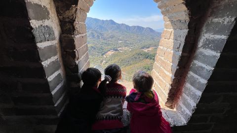 Children visit the Great Wall of China on October 1, 2022.