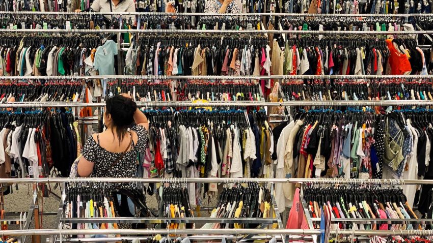 Customers browse racks of clothing as they shop inside a discount department retail store in Las Vegas, Nevada, on May 7, 2022. - The US economy added a better-than-expected 428,000 jobs in April, with the unemployment rate remaining at a low 3.6 percent, the Labor Department reported. The data pointed to continued strong employment growth and contained hints that some inflationary pressures may be easing, with workers' wages rising less than in March. But investors remain anxious that rising prices and higher interest rates will hit consumers, slowing the economy's expansion in the second half of 2022. (Photo by Patrick T. FALLON / AFP) (Photo by PATRICK T. FALLON/AFP via Getty Images)