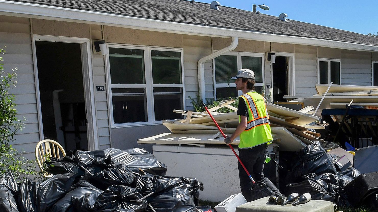 An emergency clean-up and repair worker at homes in in Kissimmee, Florida, after Hurricane Ian.