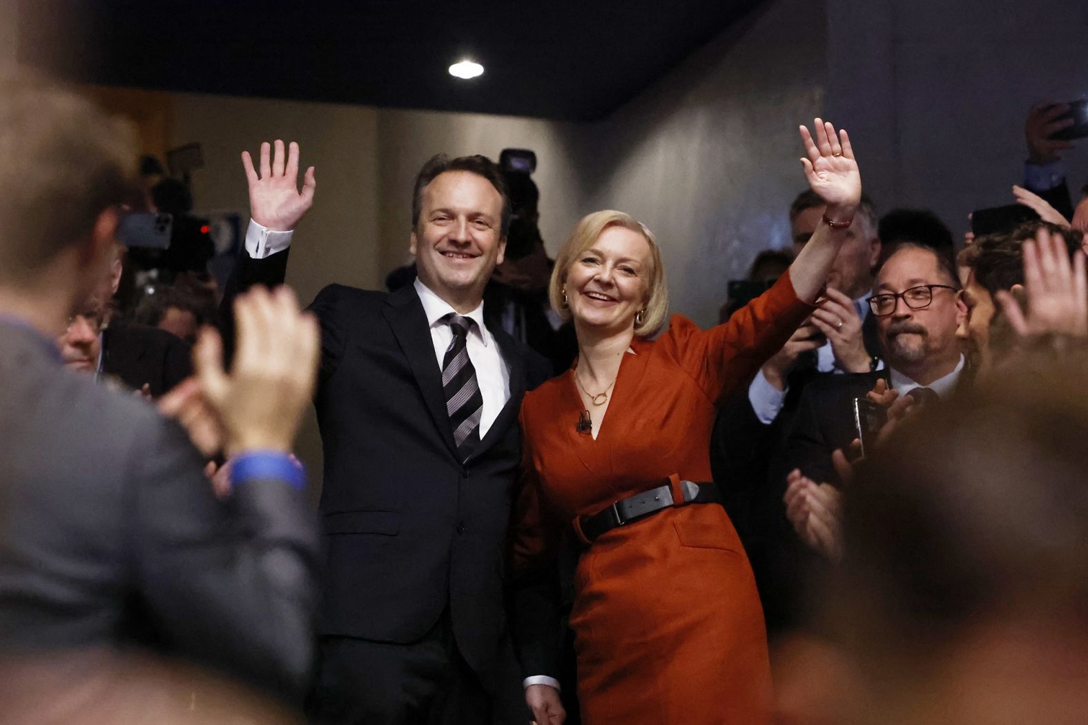 Truss poses with her husband, Hugh O'Leary, after speaking at the Conservative Party Conference in Birmingham, England, in October 2022.