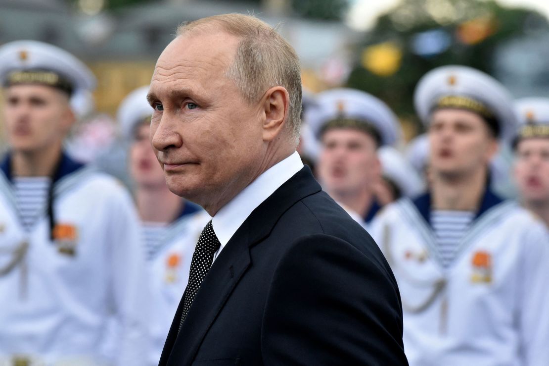 Russian President Vladimir Putin  reviews naval troops as he attends a parade marking Russian Navy Day on July 31, 2022.
