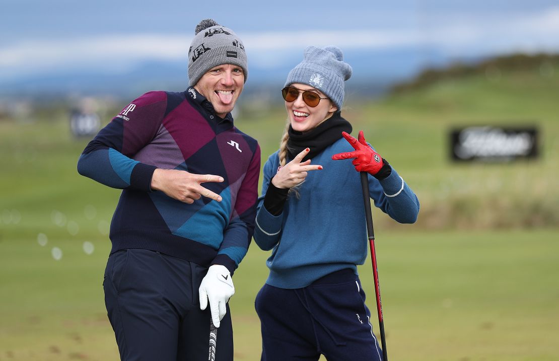 Wallace and Newton warm up ahead of their round.