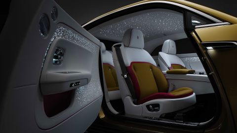 The star-lit ceiling effect, an option on other Rolls-Royce models, extends to the door trims on the Specter.