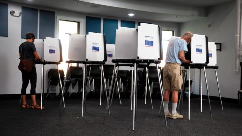 Voters cast their vote in the Blue Ash, Ohio Municipal building for the primary, Tuesday, Aug. 2, 2022.