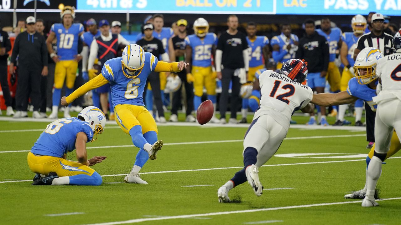 Chargers kicker Dustin Hopkins kicks the winning field goal against the Denver Broncos in overtime.