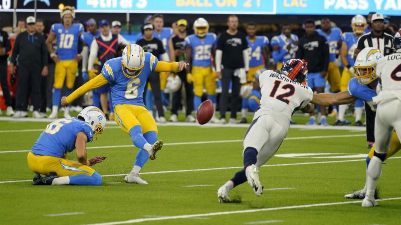 Lewis Hamilton looks on as his Denver Broncos go down against the Los Angeles Chargers | CNN