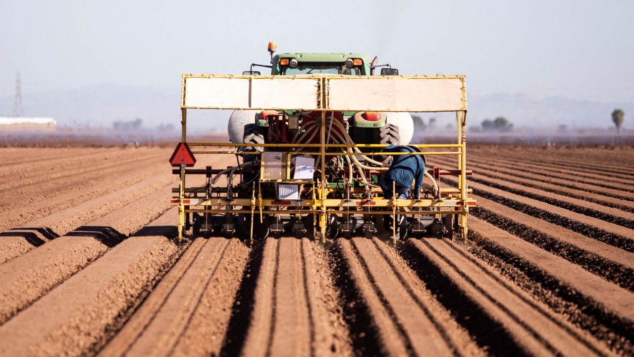 A tractor plants in Holtville, California, on September 20, 2022.