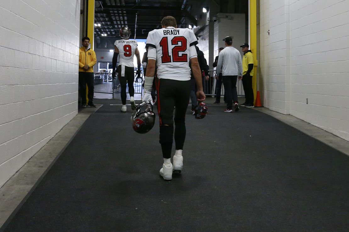 Brady walks to the locker room after a loss to the Steelers.