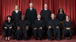 Photo taken on October 7, 2022. Formal group photograph of the Supreme Court as it was been comprised on June 30, 2022 after Justice Ketanji Brown Jackson joined the Court.  The Justices are posed in front of red velvet drapes and arranged by seniority, with five seated and four standing.

Seated from left are Justices Sonia Sotomayor, Clarence Thomas, Chief Justice John G. Roberts, Jr., and Justices Samuel A. Alito and Elena Kagan.  
Standing from left are Justices Amy Coney Barrett, Neil M. Gorsuch, Brett M. Kavanaugh, and Ketanji Brown Jackson.
 
Credit: Fred Schilling, Collection of the Supreme Court of the United States