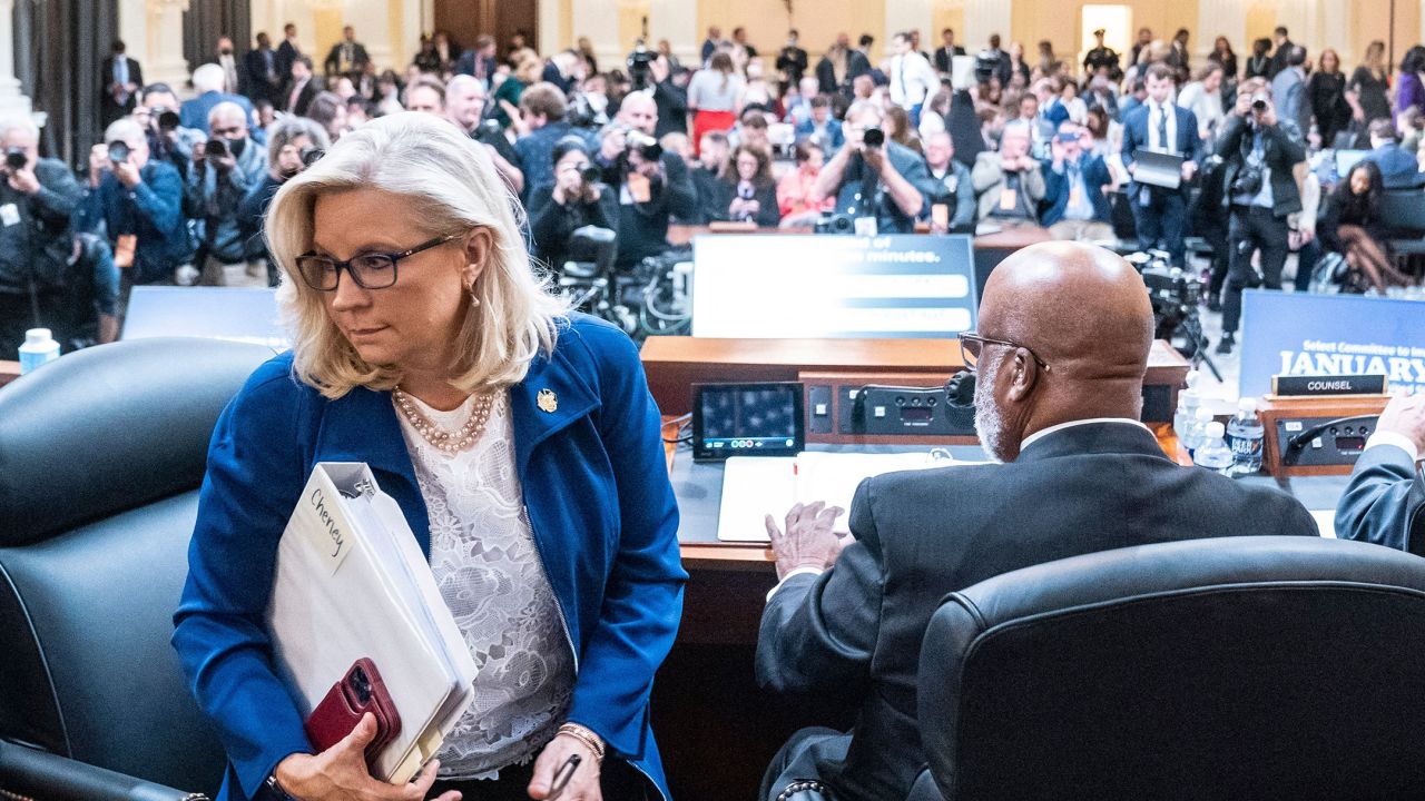 Committee Vice Chair Liz Cheney leaves during a break in the hearing to Investigate the January 6 Attack on the US Capitol, on Capitol Hill in Washington, DC, on October 13, 2022. 
