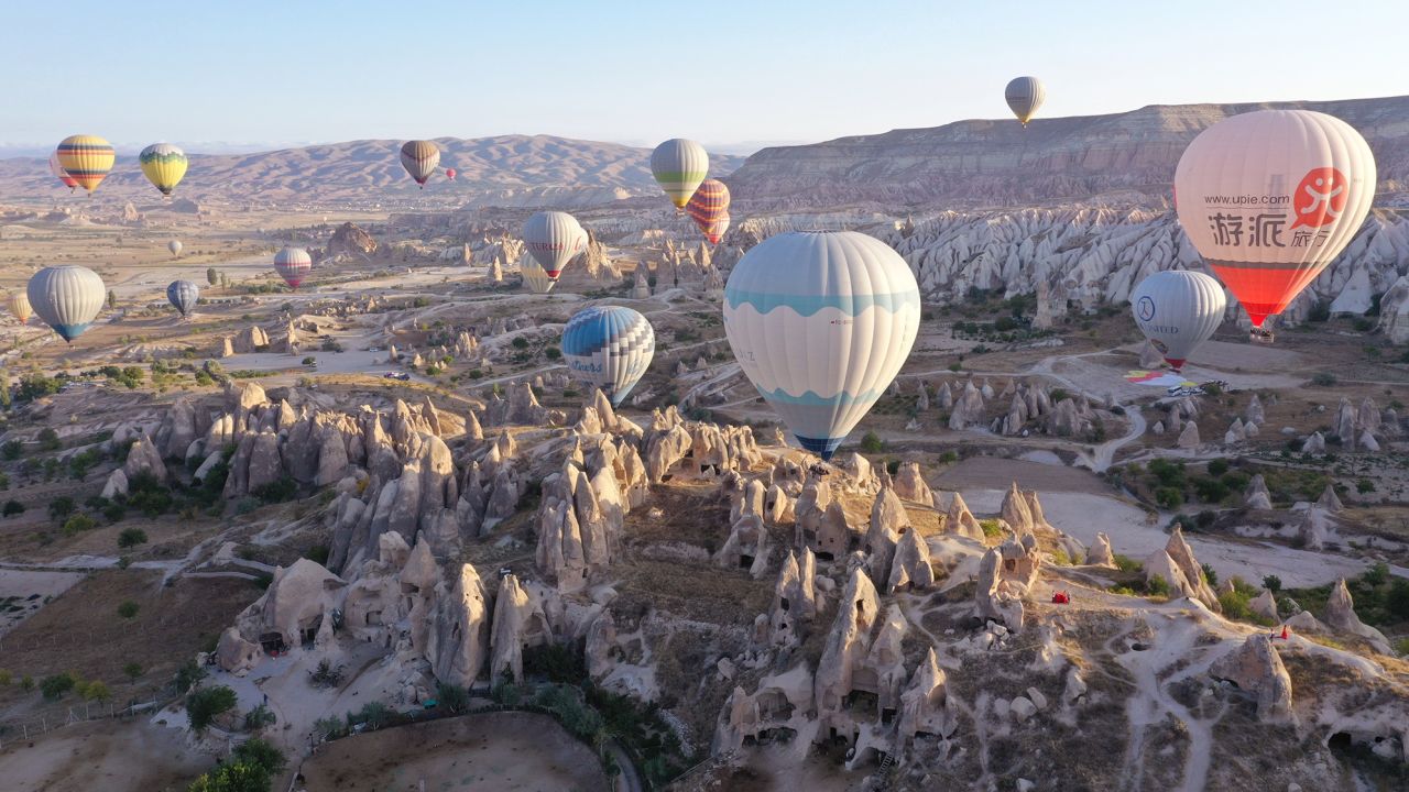 Hot air balloon tours are a popular tourist attraction in Cappadocia, Turkey. 