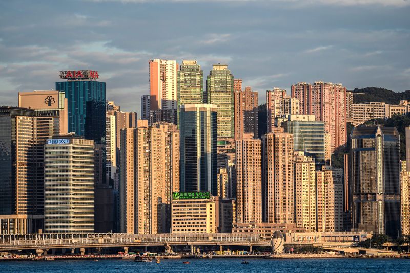 Buildings overlooking Victoria Harbour in Hong Kong pictured on October 15, 2022