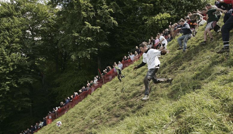 <strong>Cheese rolling: </strong>The <a href="index.php?page=&url=https%3A%2F%2Fwww.gloucestercheeserolling.co.uk%2F" target="_blank" target="_blank">Gloucestershire Cheese Rolling Race</a> is held annually at Cooper's Hill, in southern England. The aim of the race is to chase a round Double Gloucester cheese down a 200-yard hill, with the first one down crowned the winner. Minor injuries are frequent.