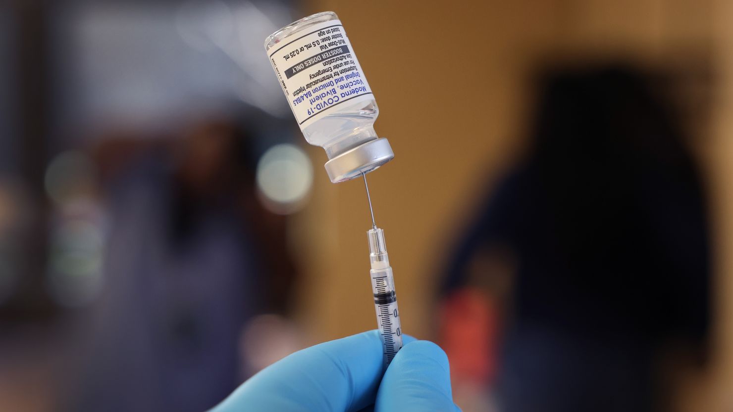 A pharmacist prepares to administer  COVID-19 vaccine booster shots during an event hosted by the Chicago Department of Public Health at the Southwest Senior Center on September 09, 2022 in Chicago, Illinois. The recently authorized booster vaccine protects against the original SARS-CoV-2 virus and the more recent omicron variants, BA.4 and BA.5.