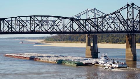 Low water restrictions on barge loading make navigation cautious in the Mississippi River in Vicksburg, Mississippi, Oct. 11.