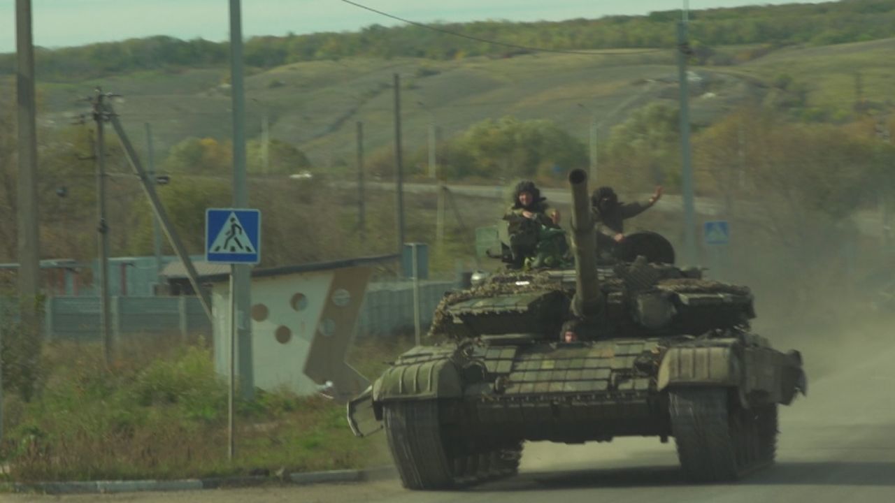 A Ukrainian tank drives past the convoy carrying CNN's team on the way out of Bakhmut. 