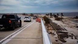 Sanibel Island residents on Wednesday drive on the causeway that runs from the mainland to the island.