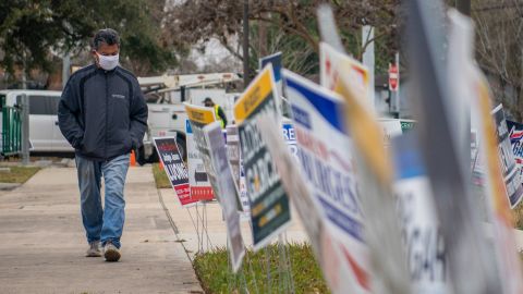 People walk to cast their primary ballots at the Moody Community Center on February 24, 2022 in Houston, Texas. 
