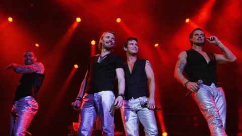 Keating (centre left) on stage with Boyzone during a 2008 performance at London's 02 Arena.
