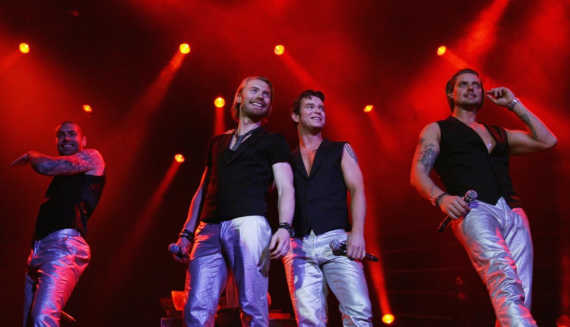 Keating (center left) on stage with Boyzone during a performance at London's 02 Arena in 2008.