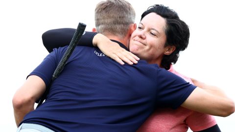 Brewerton hugs another player at Scandinavian Mixed at Halmstad Golf Club, Sweden in June.