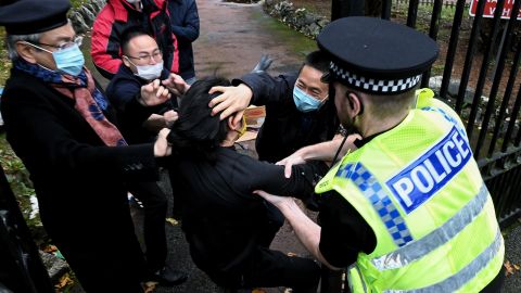 Video of the incident shows a Hong Kong protester being beaten by a group of men at the Chinese consulate compound in Manchester on October 16.