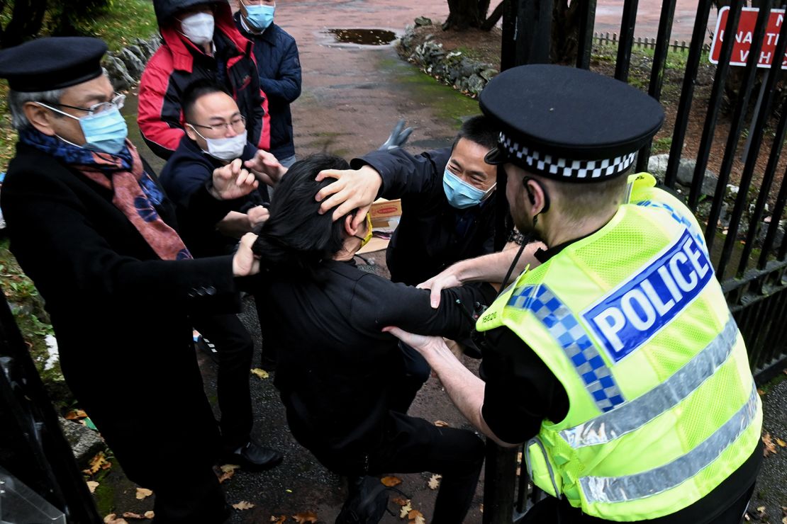 Video of the incident show a Hong Kong protester beaten by a group of men on the grounds of the Manchester Chinese consulate on October 16.