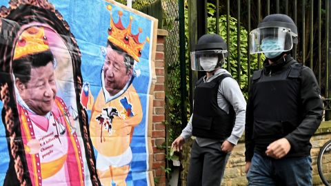 Protest banners bearing the image of Chinese leader Xi Jinping, outside the Chinese consulate in Manchester, England, on October 16.