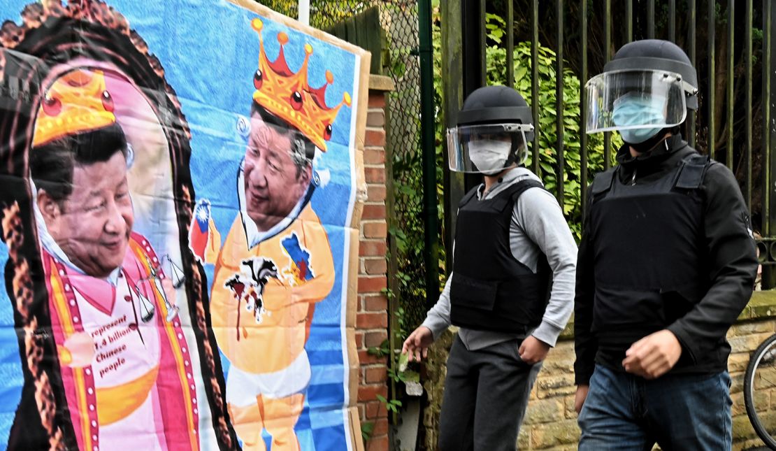 Protest banners bearing the image of Chinese leader Xi Jinping, outside the Chinese consulate in Manchester, England, on October 16.