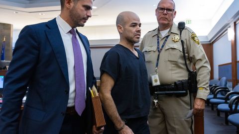 Telles, center, leaves the courtroom with a public defender after his arraignment at the Regional Justice Center, on September 20, 2022, in Las Vegas.