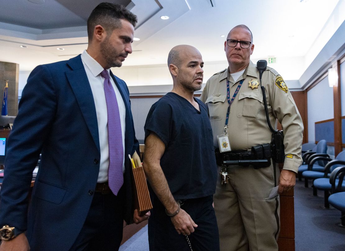 Telles, center, leaves the courtroom with a public defender after his arraignment at the Regional Justice Center, on September 20, 2022, in Las Vegas.