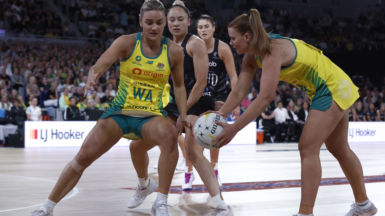 Steph Wood of the Australian Diamonds passes to Liz Watson during a Constellation Cup match against the New Zealand Silver Ferns on October 19, 2022 in Melbourne.