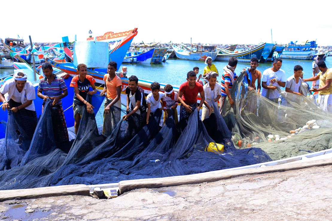 Yemeni fishermen dock their boats at the embattled Red Sea port city of Hodeida on Thursday.  