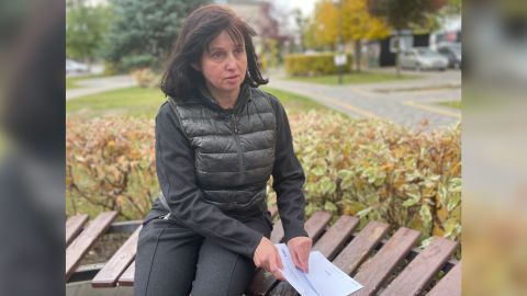 Olena Yuzvak shows the letter from her son Dima that was sent from Russia and delivered by the International Committee of the Red Cross. Written on it, just three words, "Mama, healthy, alive."