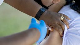 People receive booster shots during a COVID vaccination clinic at Villa Parke in Pasadena Friday, July 8, 2022. 