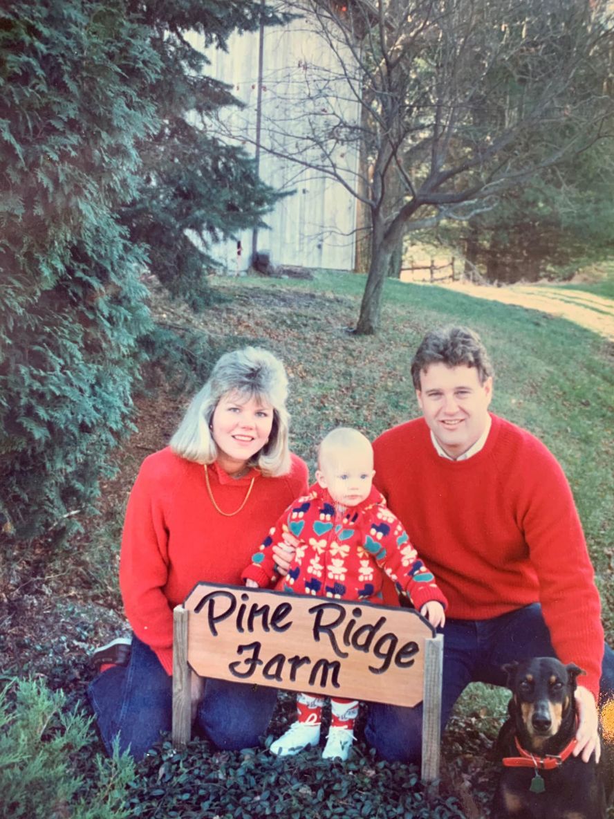 Swift was born in 1989 in West Reading, Pennsylvania, and grew up on a Christmas tree farm her father bought. She is seen here with her parents, Scott and Andrea Swift.