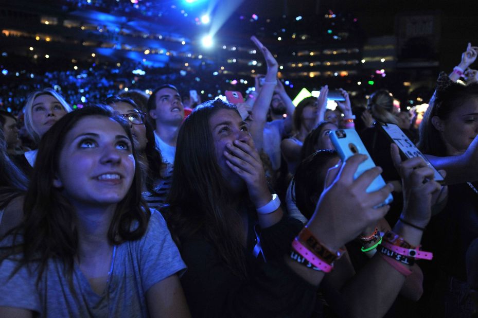 Fans react as Swift performs in Tampa in 2015.