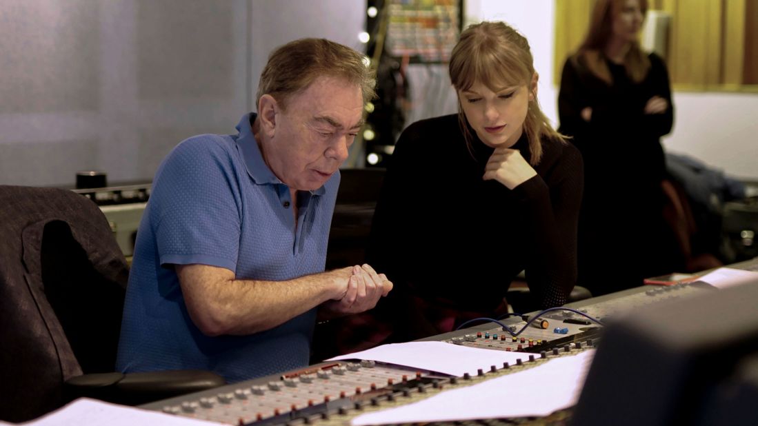 Executive producer and composer Andrew Lloyd Webber works with Swift on the set of the 2019 film "Cats," based on Webber's stage musical. Swift played Bombalurina in the movie.