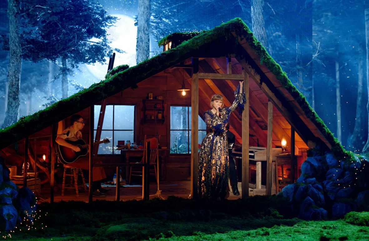 Jack Antonoff, Swift and Aaron Dessner perform onstage at 2021 Grammy Awards. The three artists collaborated for Swift's "Folklore" and "Evermore" records.