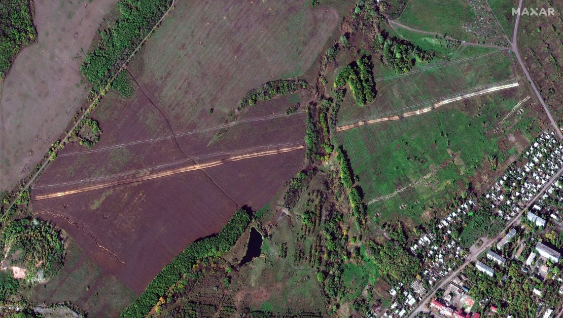 Both trench sections the Wagner group dug are seen behind the rows of anti-tank pyramids in this October 17 Maxar Technologies satellite image.