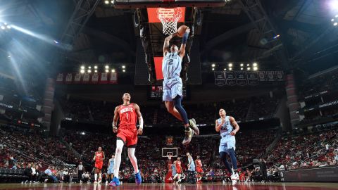 Morant throws the ball against the Houston Rockets.