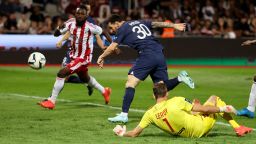 Lionel Messi of PSG scores his goal by avoiding goalkeeper of Ajaccio Benjamin Leroy during the Ligue 1 match between AC Ajaccio (ACA) and Paris Saint-Germain (PSG) at Stade Francois Coty on October 21, 2022 in Ajaccio, France. 