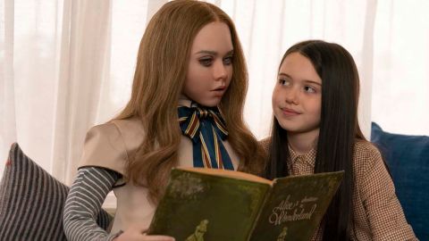 M3GAN and Cady (Violet McGraw) in the horror movie "M3GAN."